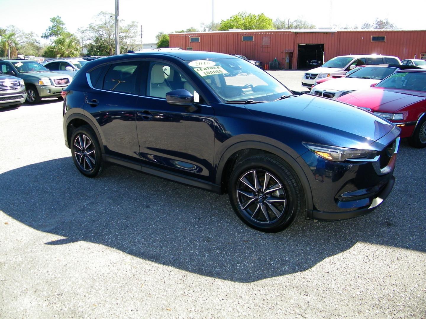 2018 Blue /Black Mazda CX-5 Grand Touring (JM3KFADM8J1) with an 2.5L L4 DOHC 16V engine, 6A transmission, located at 4000 Bee Ridge Road, Sarasota, FL, 34233, (941) 926-0300, 27.298664, -82.489151 - Photo#7